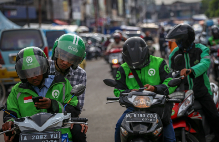 Ilustasi Driver Ojol Terkait Kenaikan Tarif Ojol Hari Ini Batal (Pikiran Rakyat)